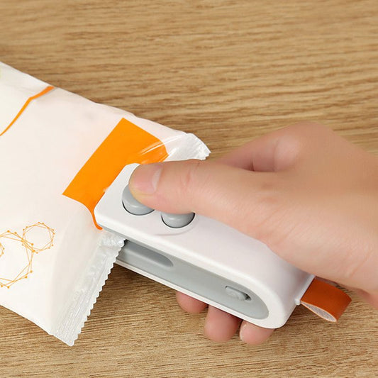 2-IN-1 Mini tragbare wiederaufladbare Beutelverschließ- und Schneidemaschine