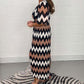 Lässiger bedruckter Jumpsuit mit weitem Bein und V-Ausschnitt