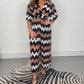 Lässiger bedruckter Jumpsuit mit weitem Bein und V-Ausschnitt